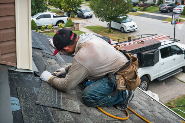 Professional Flat Roof Repair technician working in Days Creek, OR